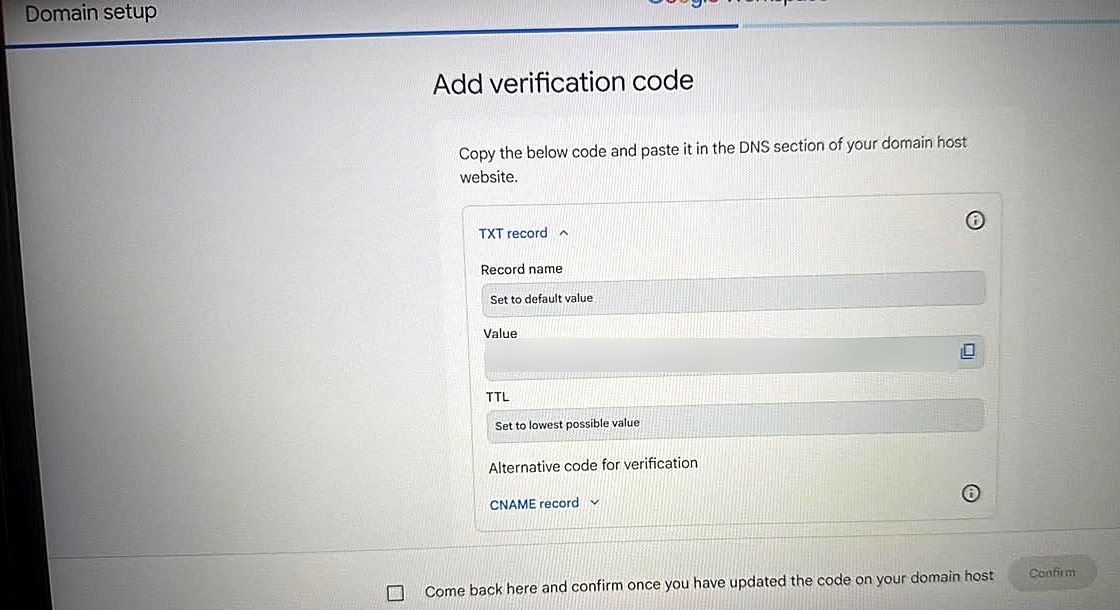 Add verification code screen showing a TXT record with Record name set to default value, a Value field containing the verification code with a copy icon, and TTL set to lowest possible value.