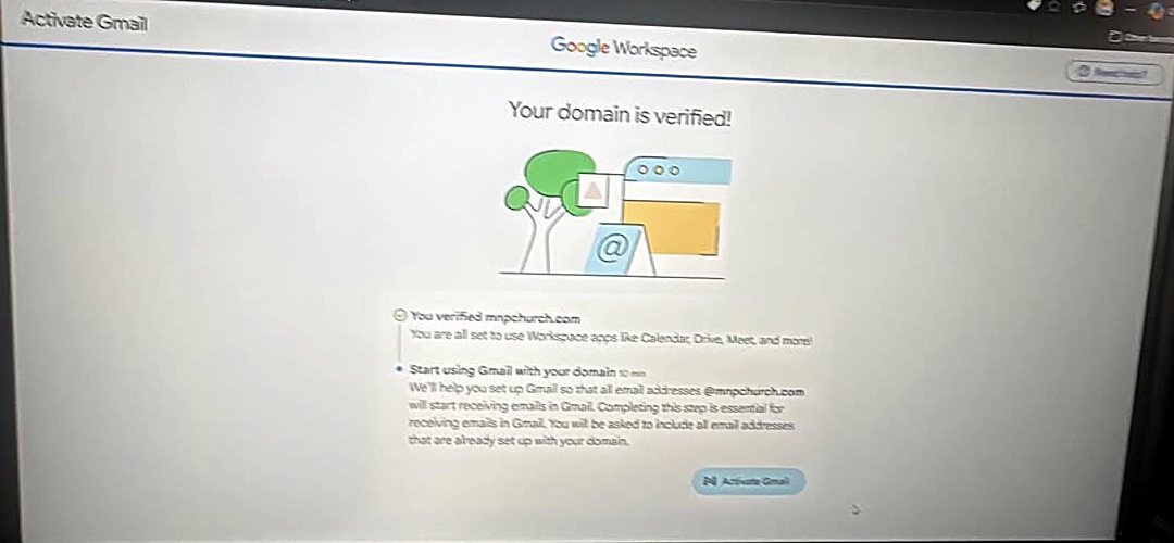 Google Workspace screen reading 'Your domain is verified!' with a green check next to the domain and a button labelled Activate Gmail.